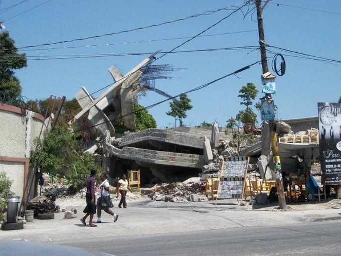 collapsed building by roadside