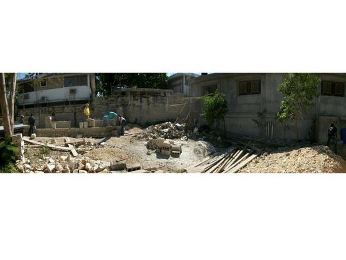 workers laying a new foundation